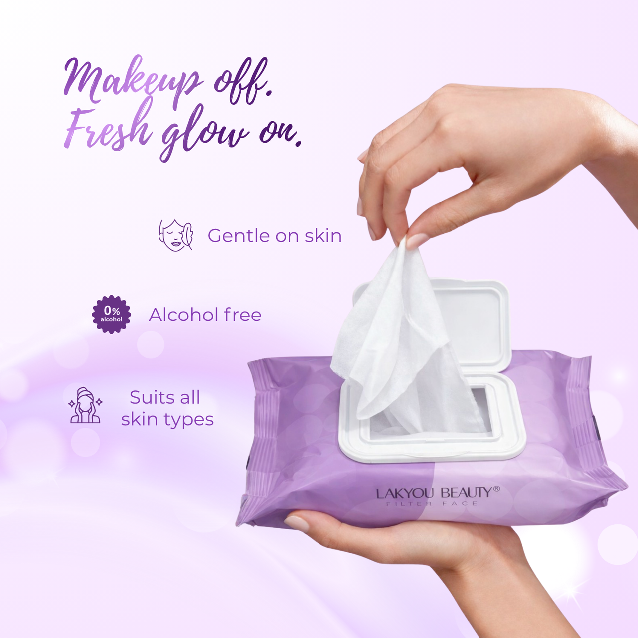 Lakyou Beauty makeup wipes with a hand pulling a wipe from the pack on a light purple background.