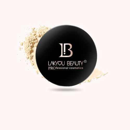 A round black makeup compact lid with the brand name 'LAKYOU BEAUTY' printed in white, shown with beige powder scattered behind it on a pale pink background.