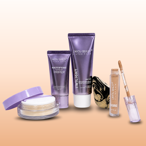 Collection of makeup products including a cream, primers, and a brush on a beige background