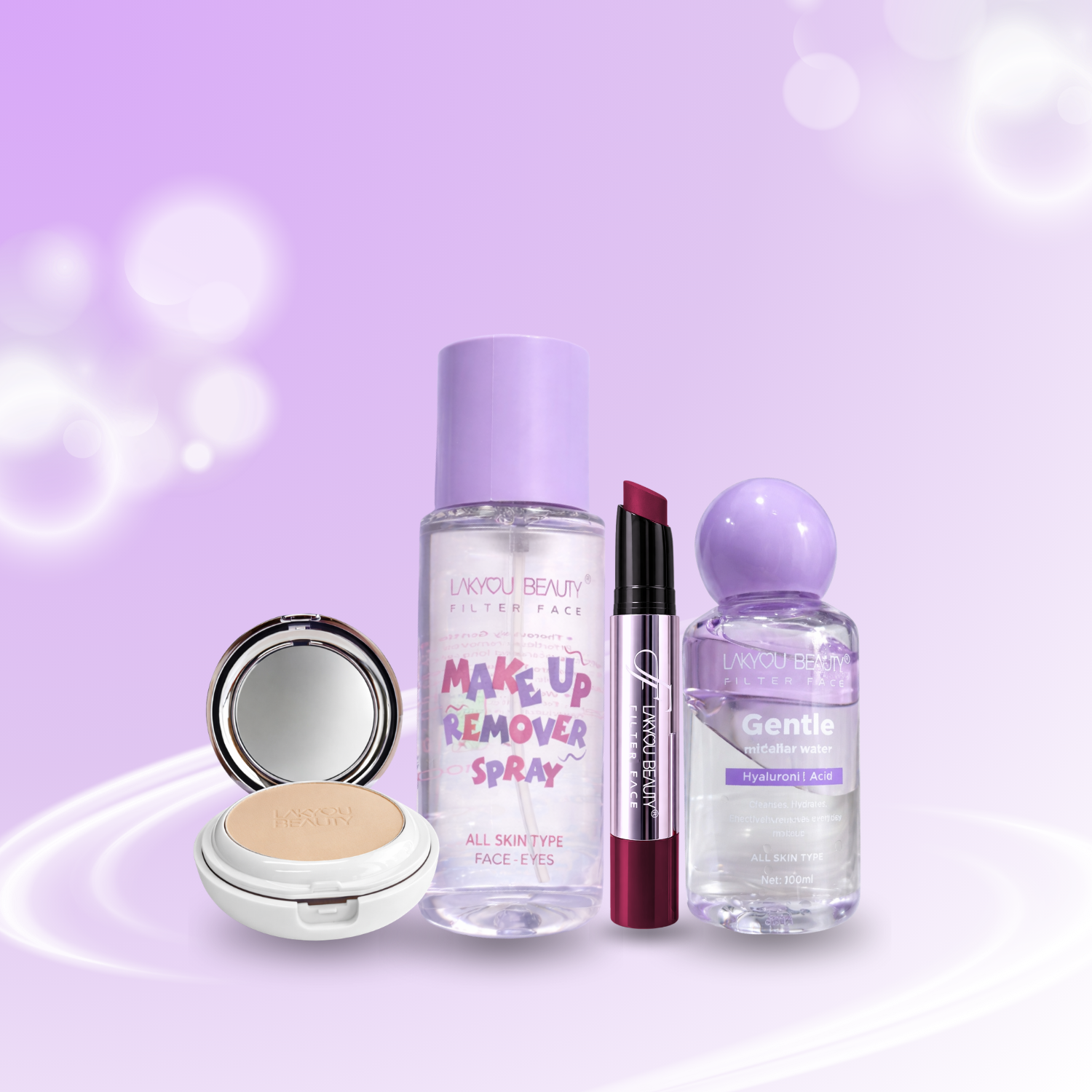 Set of makeup products including a compact, spray bottle, and lip product on a light purple background.