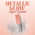 Metallic glow liquid eyeshadow with pink packaging on a soft pink background