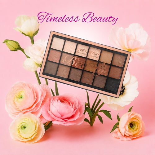 Makeup palette with flowers on a pink background, featuring the brand 'Timeless Beauty'.