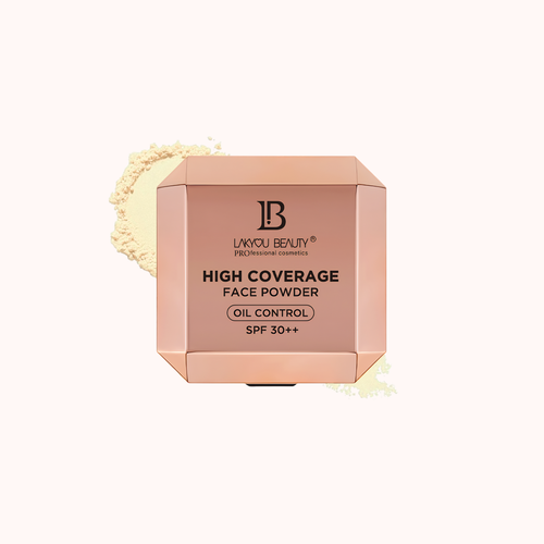 A square compact-style box of Lakyou Beauty High Coverage Face Powder in a warm peach-pink shade, shown on a very light cream background with a small powder smear behind it.